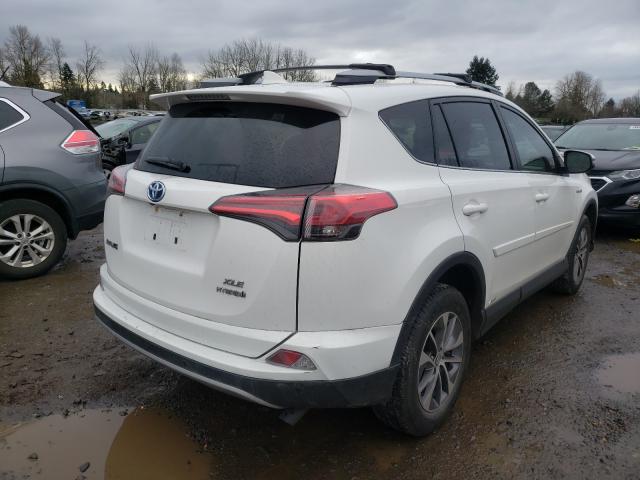 Photo 3 VIN: JTMRJREVXHD118199 - TOYOTA RAV4 HV LE 