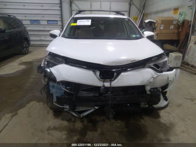 Photo 5 VIN: JTMRJREVXHD133169 - TOYOTA RAV4 HYBRID 