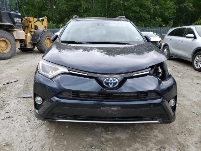 Photo 4 VIN: JTMRJREVXHD133401 - TOYOTA RAV4 HV LE 