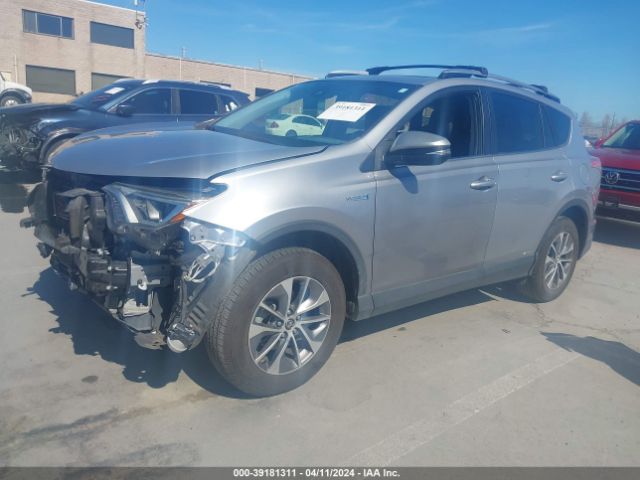 Photo 1 VIN: JTMRJREVXJD165531 - TOYOTA RAV4 HYBRID 