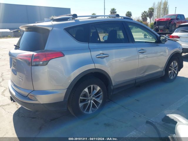 Photo 3 VIN: JTMRJREVXJD165531 - TOYOTA RAV4 HYBRID 