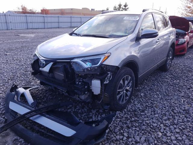 Photo 1 VIN: JTMRJREVXJD182555 - TOYOTA RAV4 HV LE 