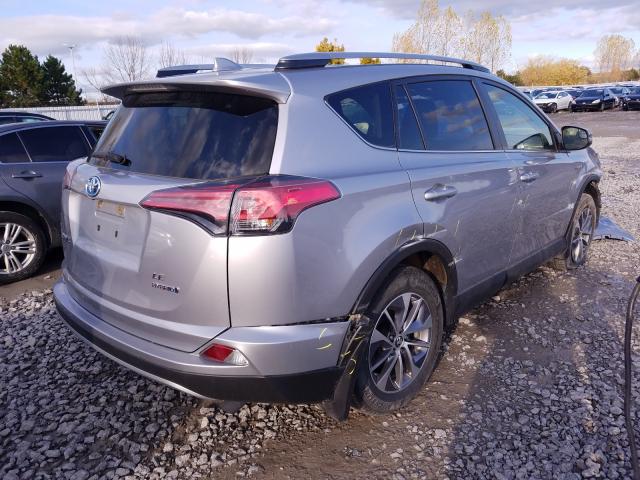 Photo 3 VIN: JTMRJREVXJD182555 - TOYOTA RAV4 HV LE 