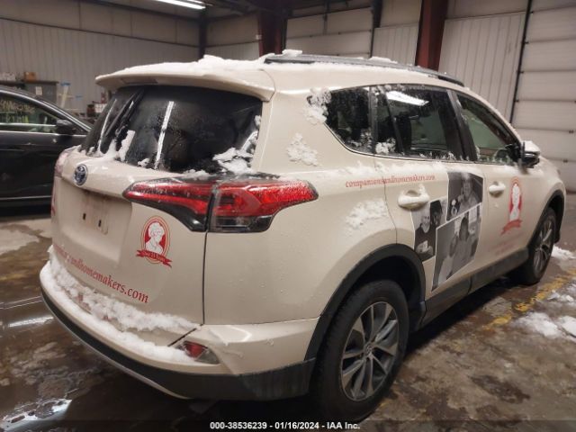 Photo 3 VIN: JTMRJREVXJD222584 - TOYOTA RAV4 HYBRID 