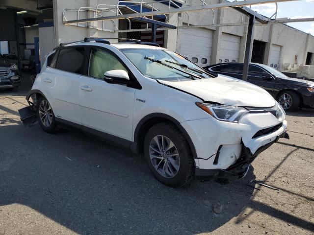 Photo 3 VIN: JTMRJREVXJD254628 - TOYOTA RAV4 HV LE 