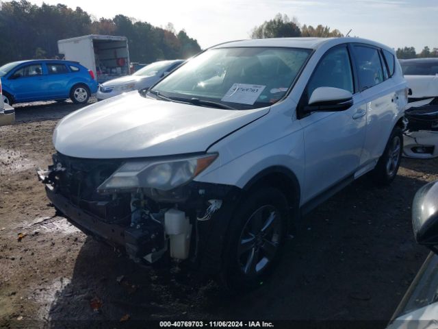 Photo 1 VIN: JTMWFREV0FJ040695 - TOYOTA RAV4 