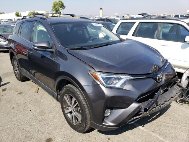 Photo 3 VIN: JTMWFREV0HJ130304 - TOYOTA RAV4 XLE 