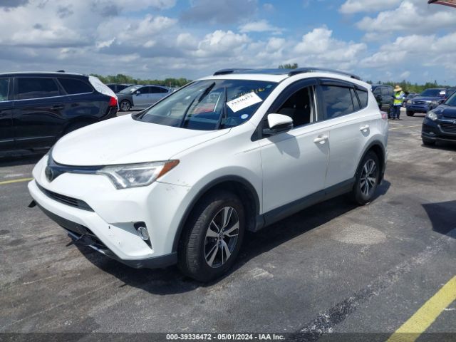 Photo 1 VIN: JTMWFREV0JJ164037 - TOYOTA RAV4 