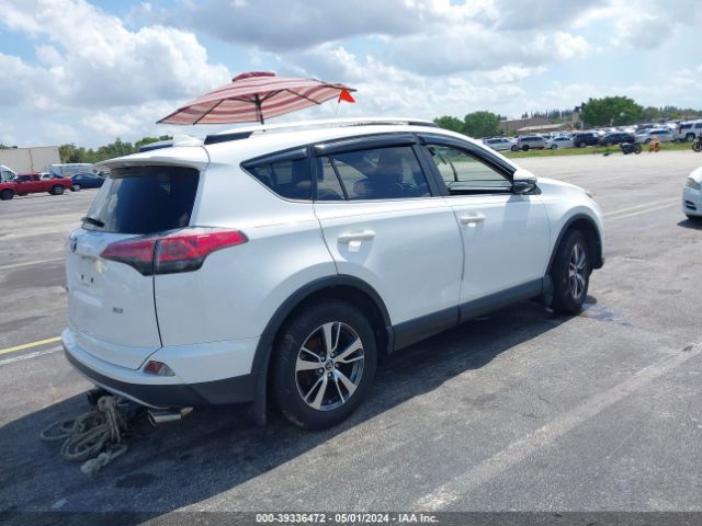 Photo 3 VIN: JTMWFREV0JJ164037 - TOYOTA RAV4 