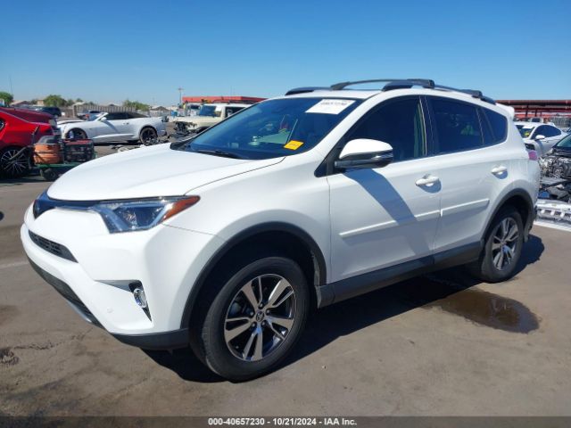 Photo 1 VIN: JTMWFREV0JJ170890 - TOYOTA RAV4 