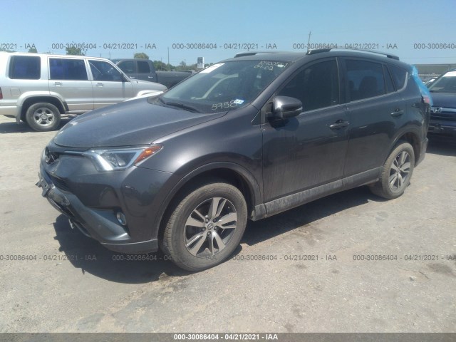 Photo 1 VIN: JTMWFREV0JJ175958 - TOYOTA RAV4 