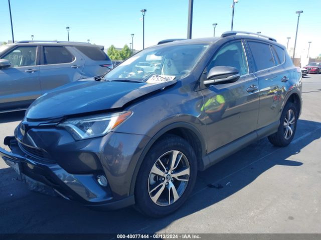 Photo 1 VIN: JTMWFREV0JJ731847 - TOYOTA RAV4 