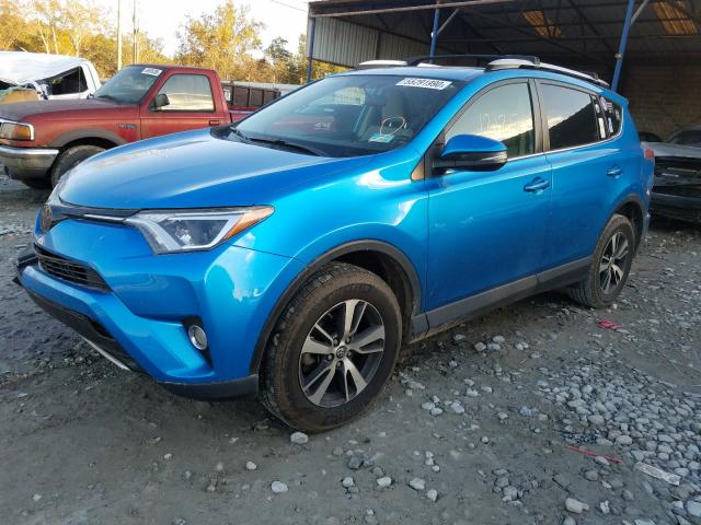 Photo 1 VIN: JTMWFREV1GD091414 - TOYOTA RAV4 XLE 