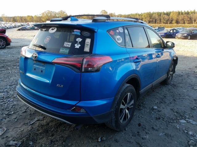 Photo 3 VIN: JTMWFREV1GD091414 - TOYOTA RAV4 XLE 