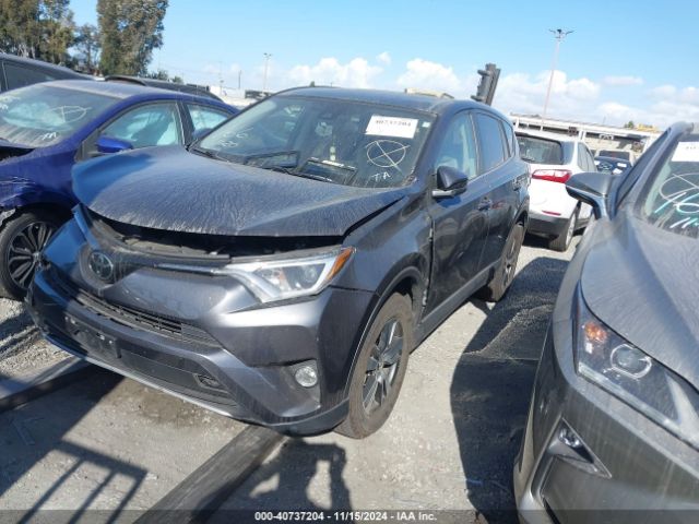 Photo 1 VIN: JTMWFREV1JJ745756 - TOYOTA RAV4 