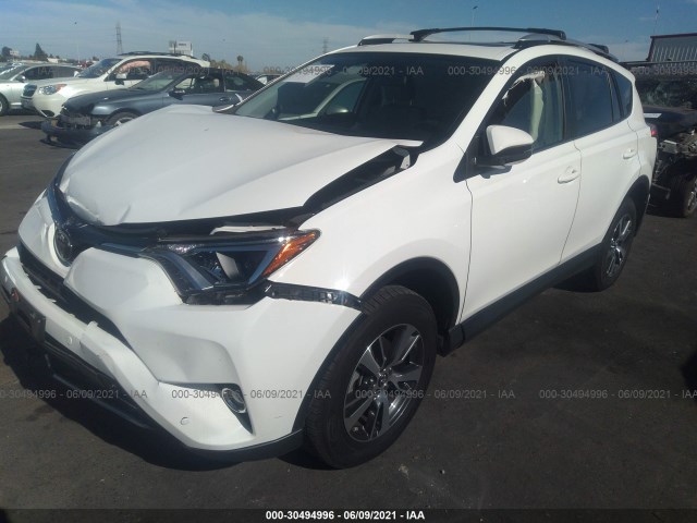 Photo 1 VIN: JTMWFREV2GJ080522 - TOYOTA RAV4 