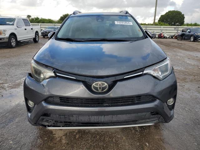 Photo 4 VIN: JTMWFREV2HD101868 - TOYOTA RAV4 XLE 