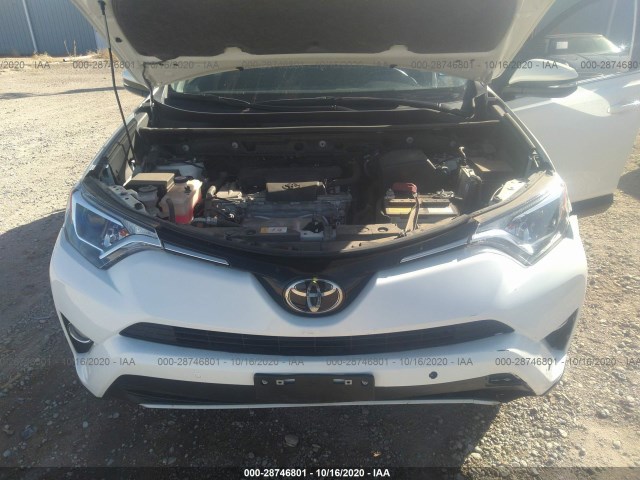 Photo 9 VIN: JTMWFREV2JJ168901 - TOYOTA RAV4 