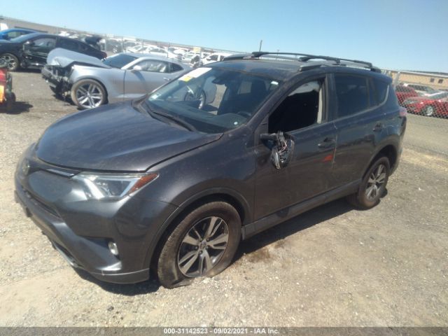 Photo 1 VIN: JTMWFREV2JJ180188 - TOYOTA RAV4 