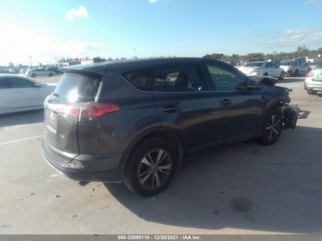 Photo 3 VIN: JTMWFREV2JJ206112 - TOYOTA RAV4 