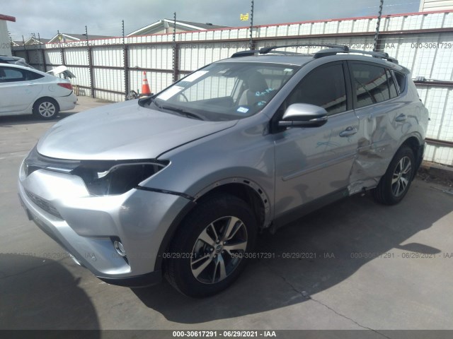 Photo 1 VIN: JTMWFREV2JJ207857 - TOYOTA RAV4 