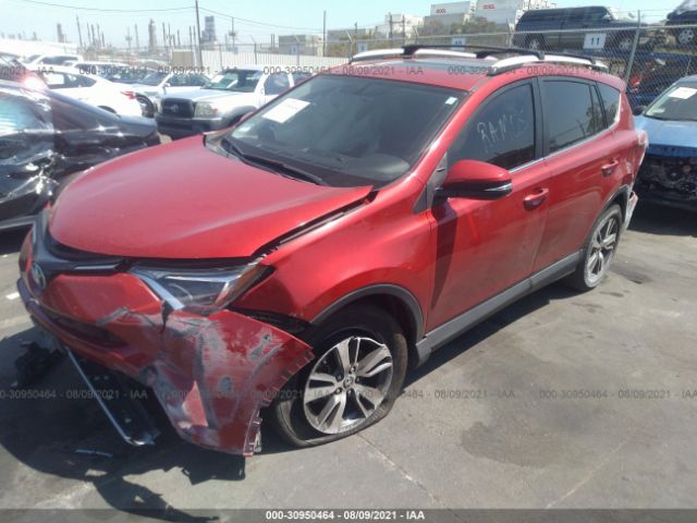 Photo 1 VIN: JTMWFREV4GJ075077 - TOYOTA RAV4 