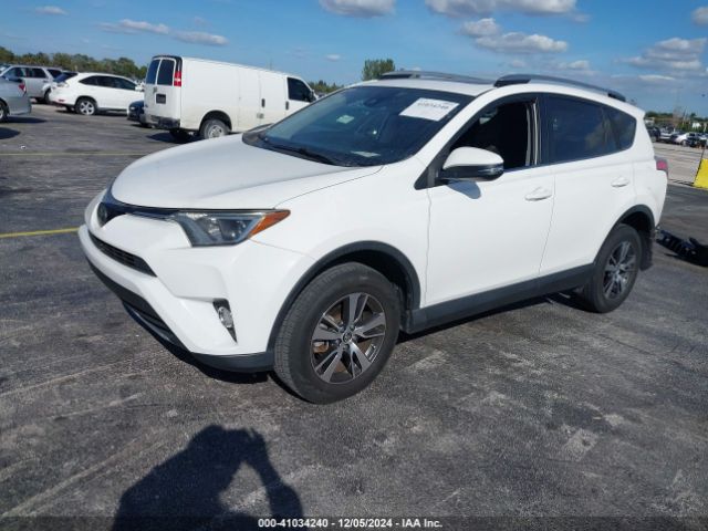 Photo 1 VIN: JTMWFREV4HJ717119 - TOYOTA RAV4 