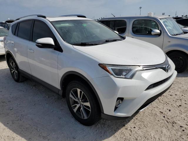 Photo 3 VIN: JTMWFREV7GJ060539 - TOYOTA RAV4 XLE 