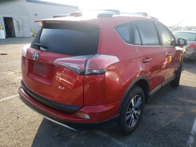 Photo 3 VIN: JTMWFREV7GJ067359 - TOYOTA RAV4 XLE 