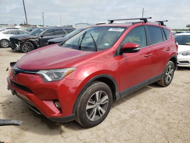 Photo 1 VIN: JTMWFREV7GJ082167 - TOYOTA RAV4 XLE 