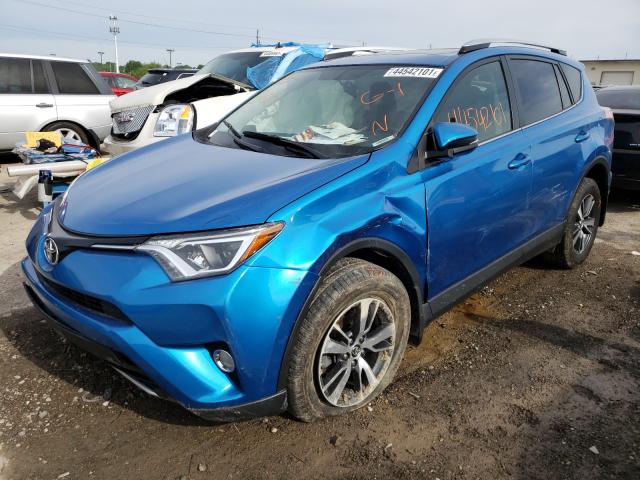 Photo 1 VIN: JTMWFREV7GJ083335 - TOYOTA RAV4 XLE 