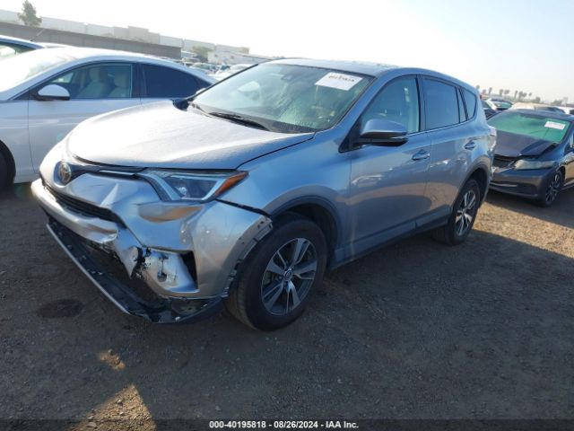 Photo 1 VIN: JTMWFREV7JD114573 - TOYOTA RAV4 