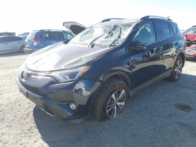 Photo 1 VIN: JTMWFREV8HJ111077 - TOYOTA RAV4 XLE 