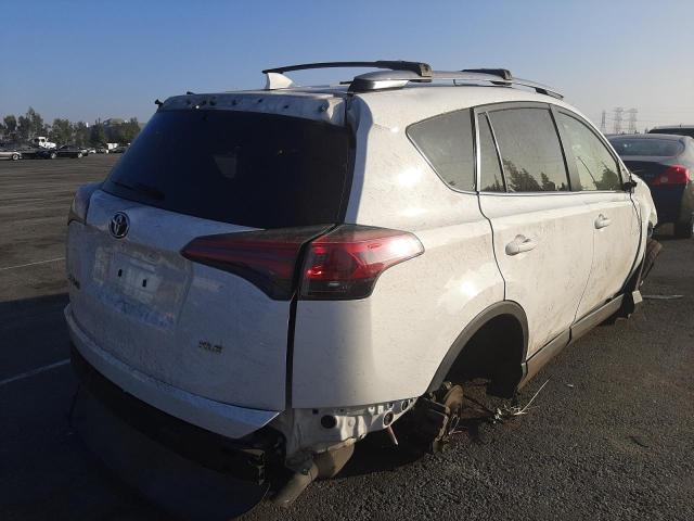 Photo 3 VIN: JTMWFREV9HD094871 - TOYOTA RAV4 XLE 