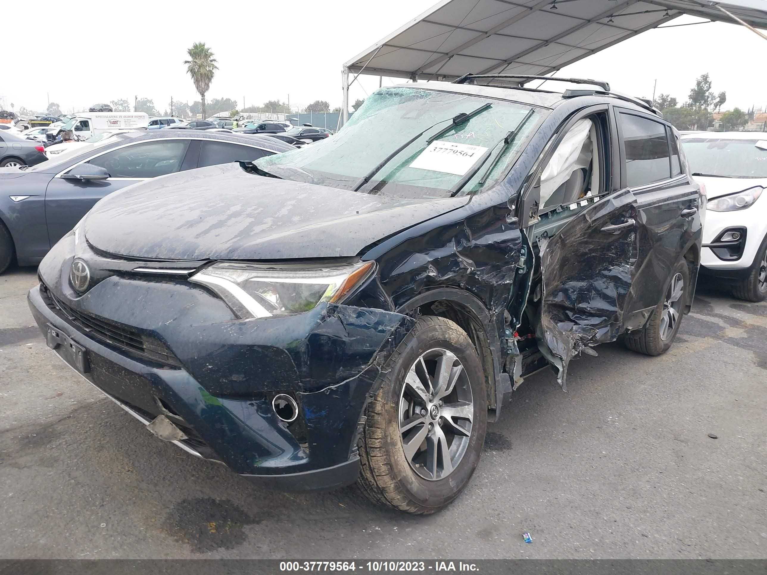 Photo 1 VIN: JTMWFREV9JJ203806 - TOYOTA RAV 4 