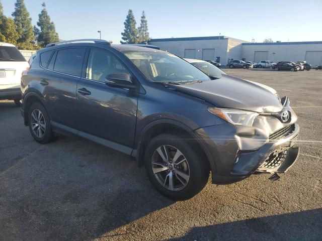 Photo 3 VIN: JTMWFREVXGJ074659 - TOYOTA RAV4 XLE 