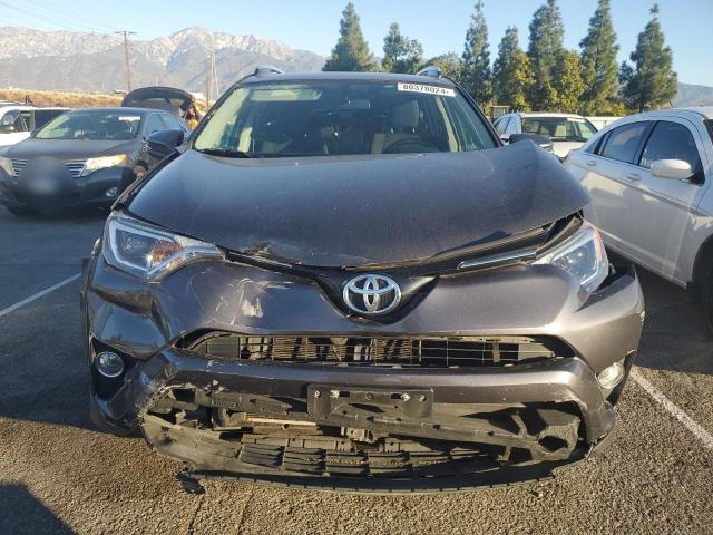 Photo 4 VIN: JTMWFREVXGJ074659 - TOYOTA RAV4 XLE 