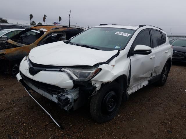 Photo 1 VIN: JTMWFREVXGJ092854 - TOYOTA RAV4 XLE 