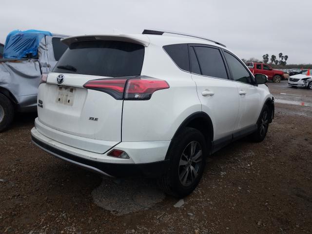 Photo 3 VIN: JTMWFREVXGJ092854 - TOYOTA RAV4 XLE 