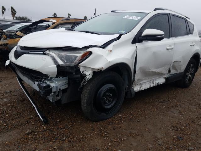 Photo 8 VIN: JTMWFREVXGJ092854 - TOYOTA RAV4 XLE 