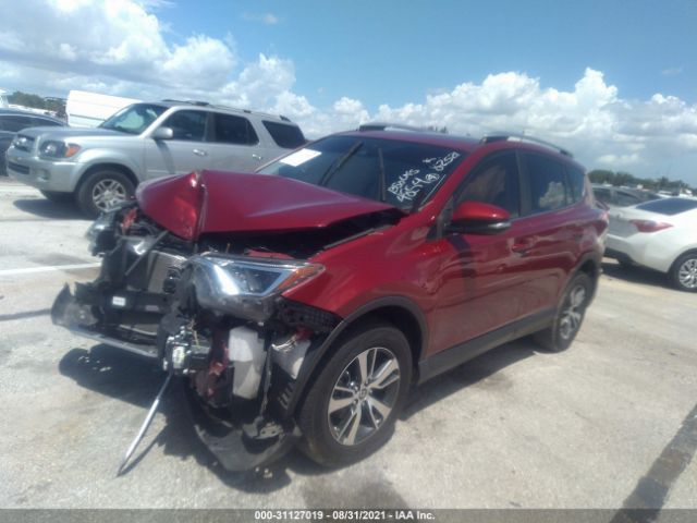 Photo 1 VIN: JTMWFREVXJD124854 - TOYOTA RAV4 