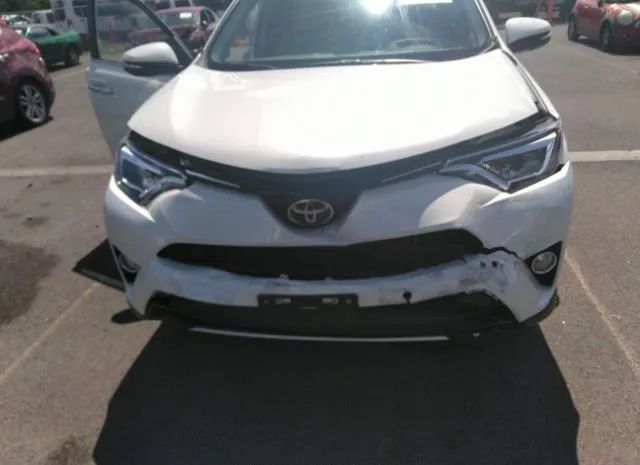 Photo 5 VIN: JTMYFREV4GJ083754 - TOYOTA RAV4 