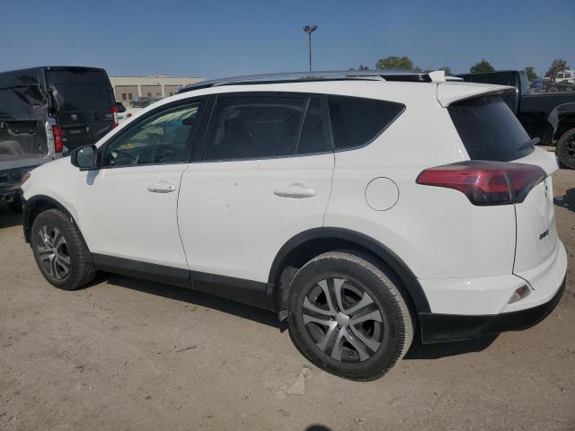 Photo 1 VIN: JTMZFREV0GJ097641 - TOYOTA RAV4 LE 