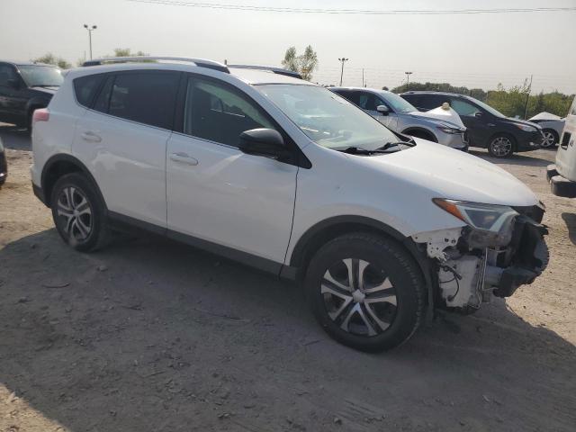 Photo 3 VIN: JTMZFREV0GJ097641 - TOYOTA RAV4 LE 