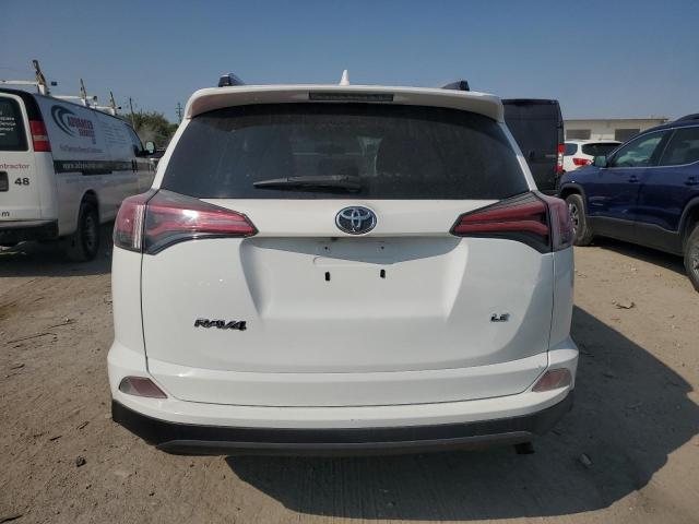 Photo 5 VIN: JTMZFREV0GJ097641 - TOYOTA RAV4 LE 