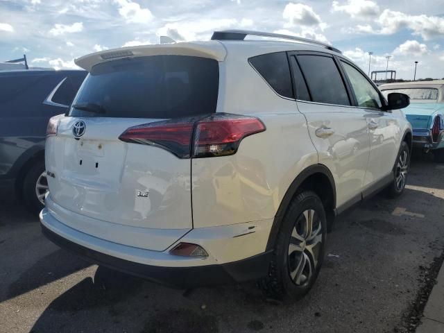 Photo 3 VIN: JTMZFREV0JD111480 - TOYOTA RAV4 LE 