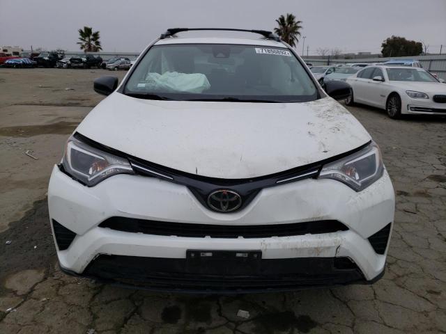 Photo 4 VIN: JTMZFREV0JJ172457 - TOYOTA RAV4 LE 