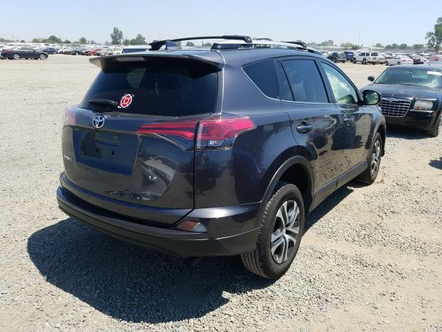 Photo 3 VIN: JTMZFREV0JJ205862 - TOYOTA RAV4 LE 