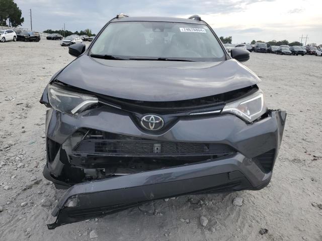 Photo 4 VIN: JTMZFREV0JJ749827 - TOYOTA RAV4 LE 