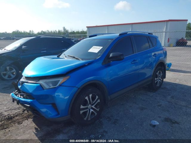 Photo 1 VIN: JTMZFREV1GJ086986 - TOYOTA RAV4 